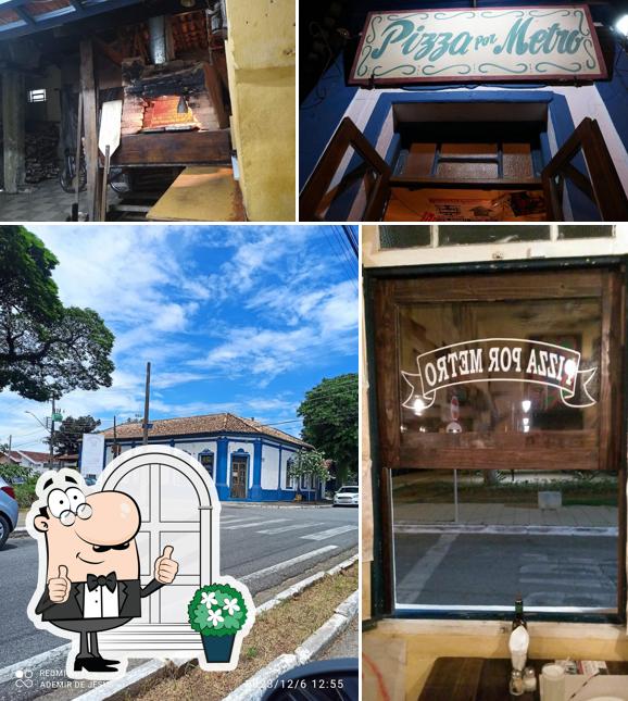 Veja imagens do exterior do Pizza Por Metro