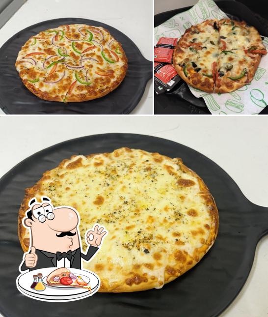 Pick pizza at Chai Sutta Bar 15 Panchkula