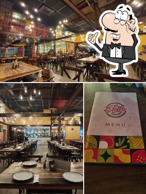 Veja imagens do interior do Stella Cantina & Pizzaria
