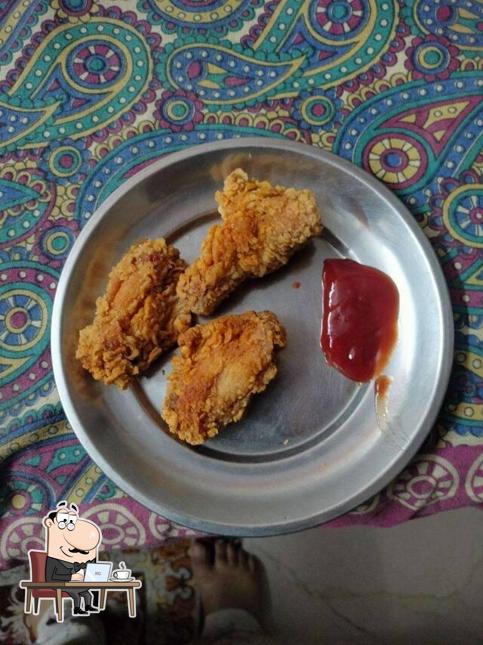 Take a seat at one of the tables at KFC