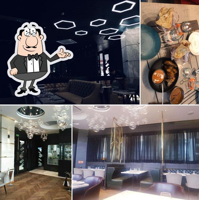 Take a seat at one of the tables at Nueva