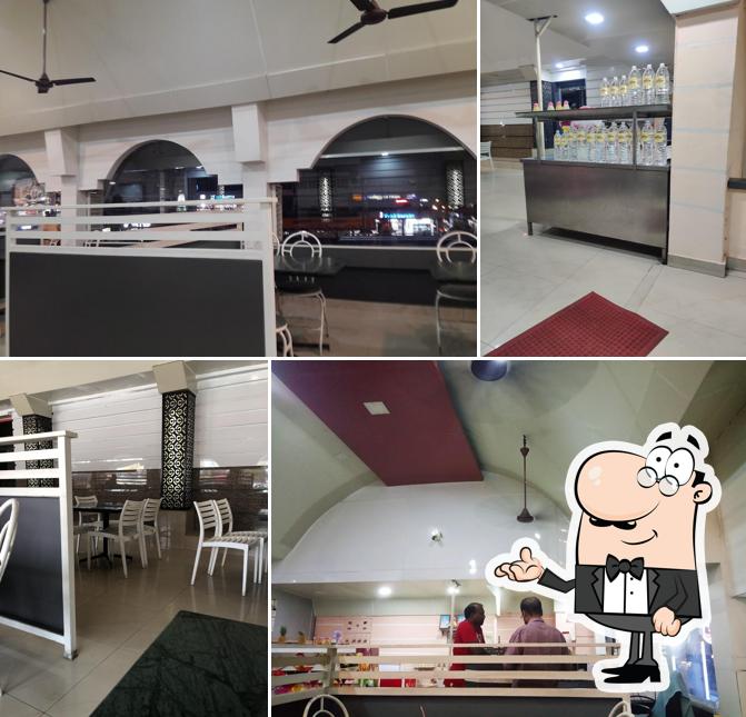 Take a seat at one of the tables at Rappai's Fast Food