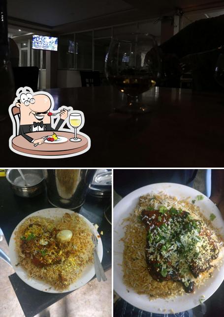 The photo of Madhuri AC Bar and Restaurant’s food and interior