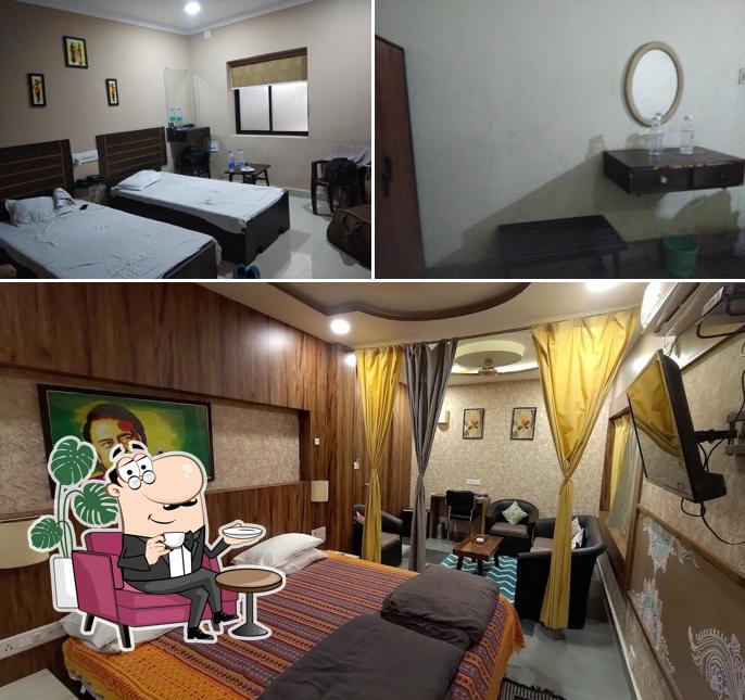 Take a seat at one of the tables at Hotel Ashoka