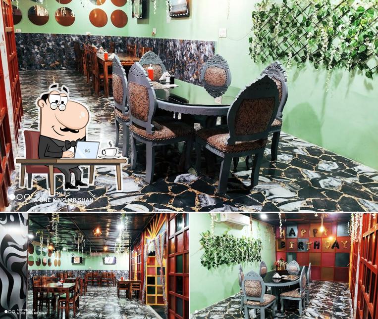 Take a seat at one of the tables at Pizza Factory World