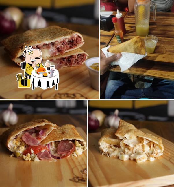 Sanduíche de carne de porco desfiada em Tio do Pastel