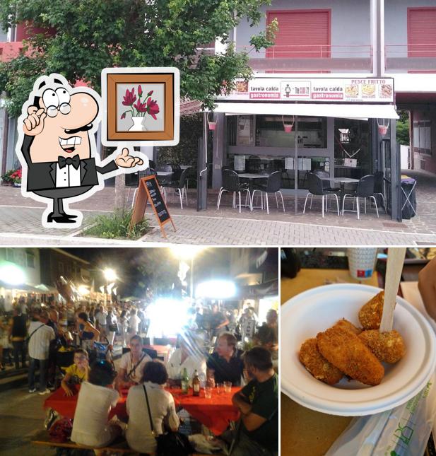 Questa è la foto che presenta la interni e cibo di The Club 72