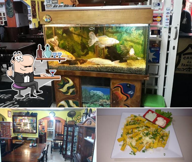 A foto da interior e comida a Casa da Família Pizzaria