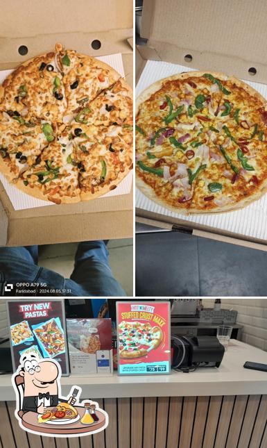 Get pizza at Pizza Hut Sector 15, Faridabad