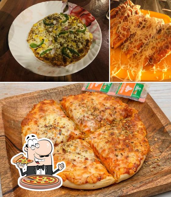 Try out pizza at Essence The Rooftop Cafe