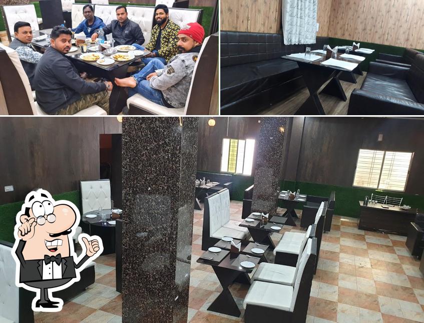 Take a seat at one of the tables at The Dark Love Resort