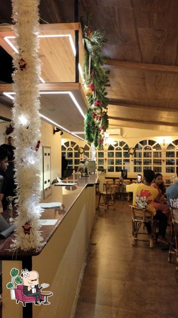 Take a seat at one of the tables at Club House Restaurant