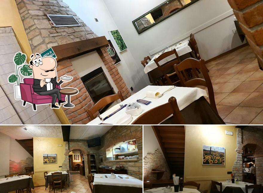 La interni e tavolo da pranzo del ristorante