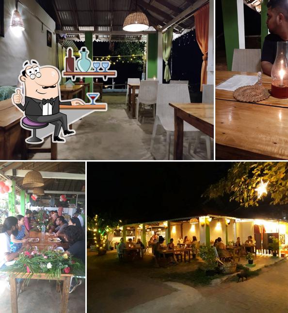 Take a seat at one of the tables at Holy Rabbit Restaurant