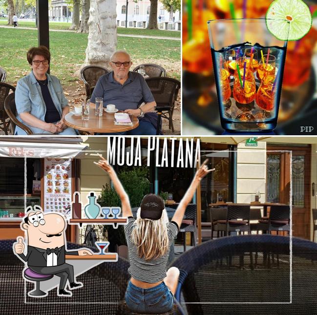 Questa è la immagine che mostra la interni e alcol di Platana Bar