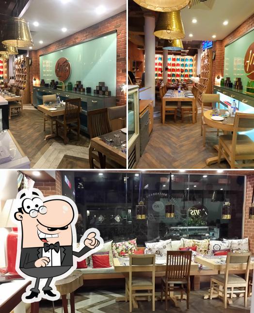 Take a seat at one of the tables at Anns Signature Bistro