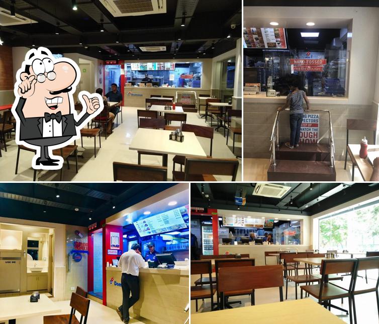 Take a seat at one of the tables at Domino's