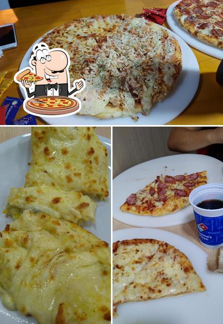 No Domino's Pizza - Jardim Botânico, você pode provar pizza