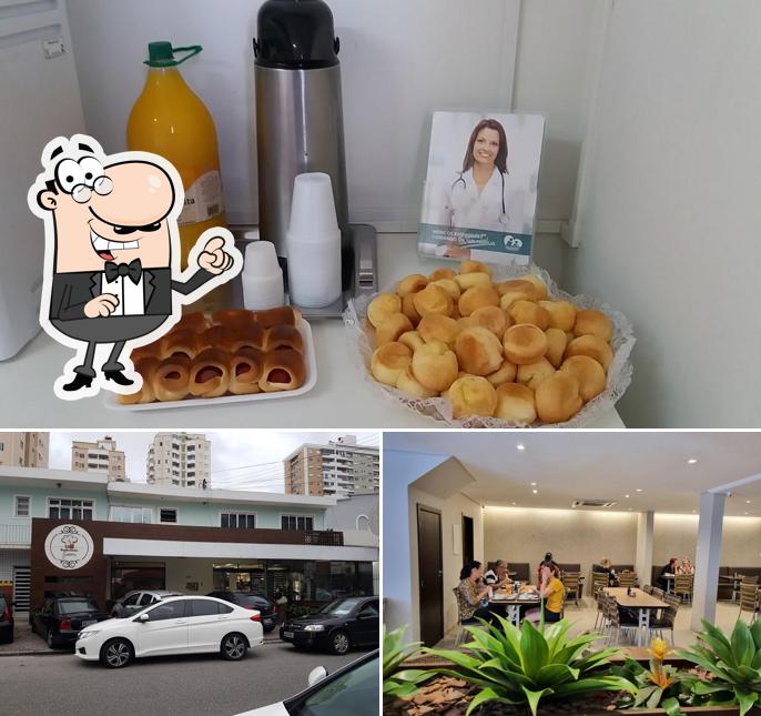 Sente em uma das mesas no Panificadora Juliana