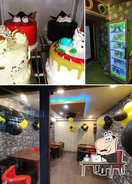 Check out the picture depicting interior and food at Berozgar Cafe