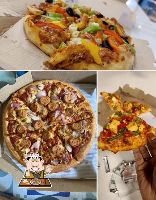 Pick pizza at Domino's Pizza D.N Regalia Mall, Patrapada