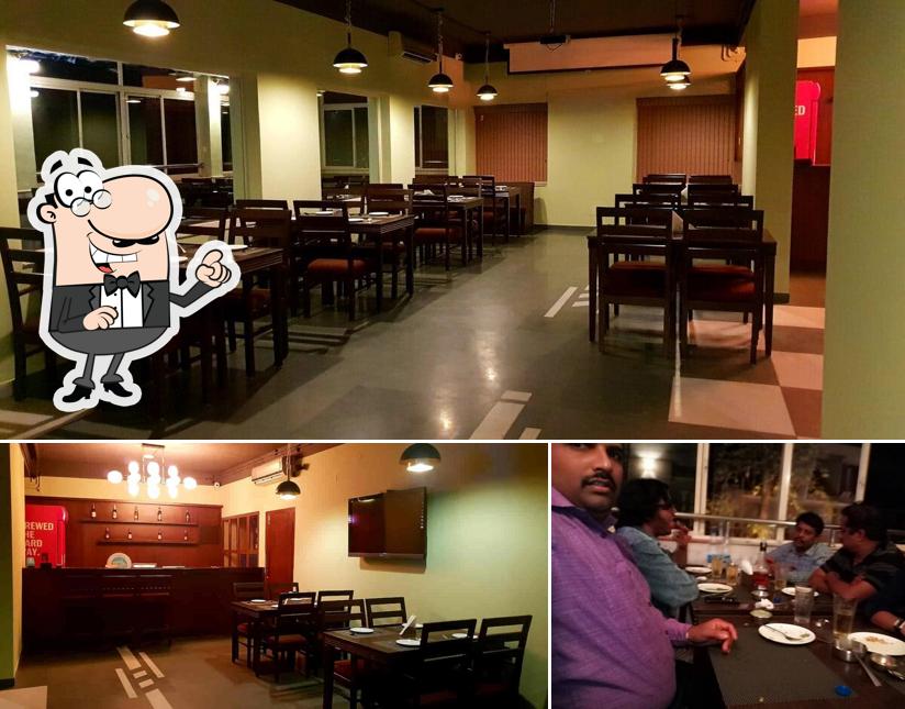 Take a seat at one of the tables at Nikki's Pub & Restaurant