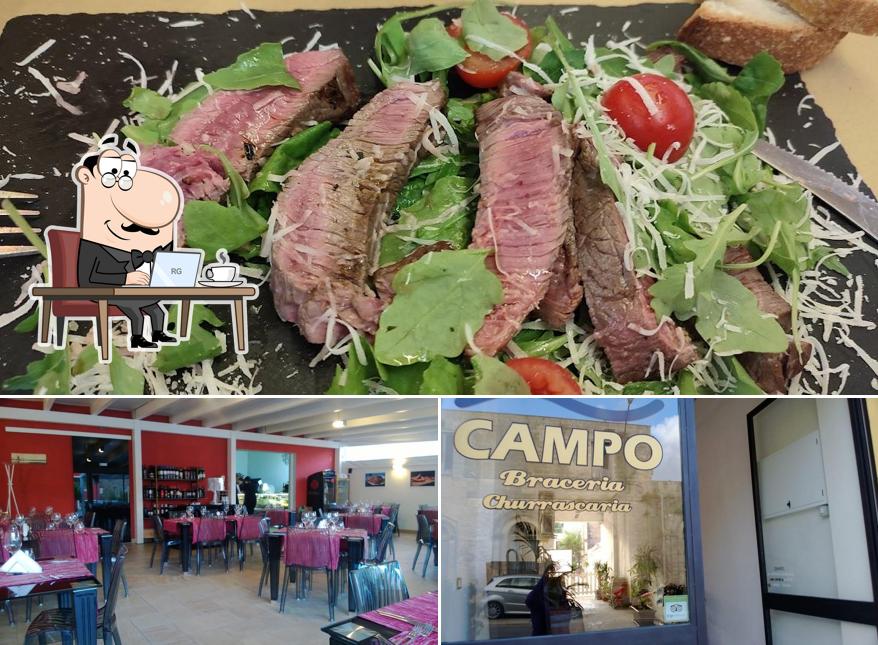 Dai un’occhiata alla foto che presenta la interni e cibo di campo la braceria