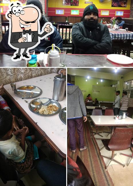 The interior of Pooja Restaurant