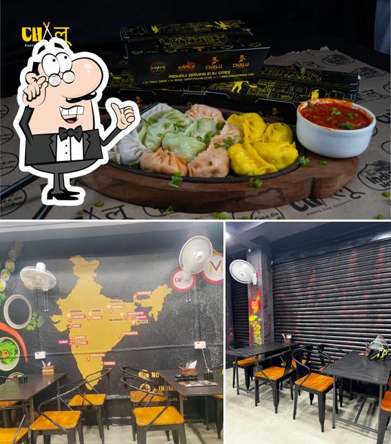 This is the picture showing interior and beverage at Chalu Aapna Desi Chinese