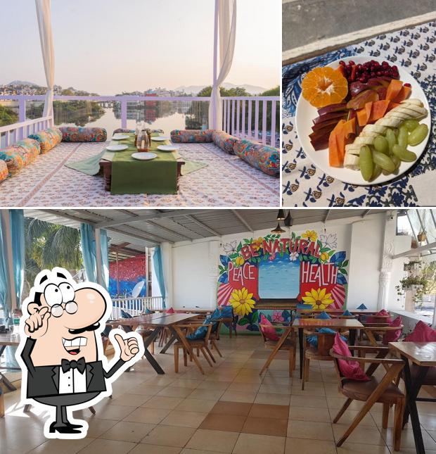 Take a seat at one of the tables at La Marina Bistro (Rooftop Lakeview Restaurant)