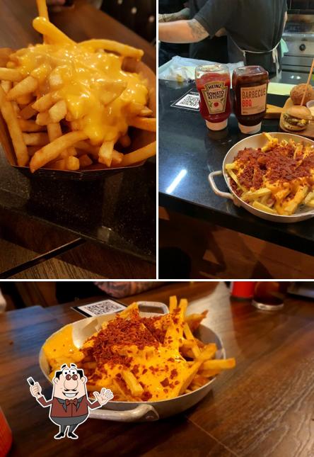 Platos en Burger Happens Deli House