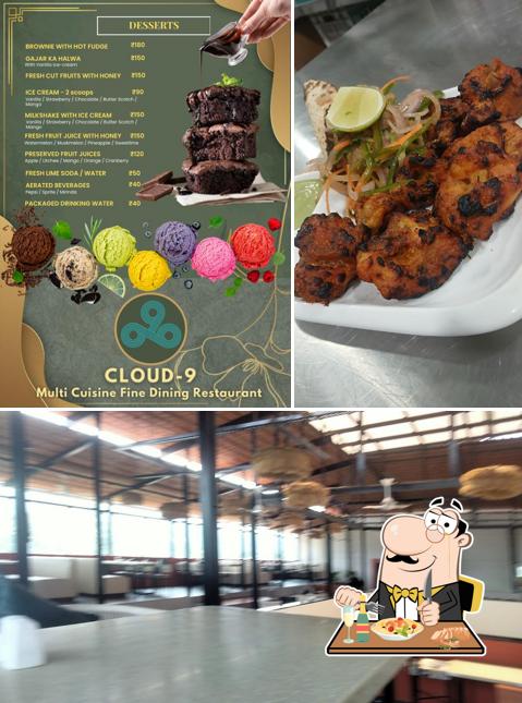 Check out the image depicting food and interior at PNS NAKSHATRA - CLOUD NINE - ROOF TOP - MULTICUISINE RESTAURANT