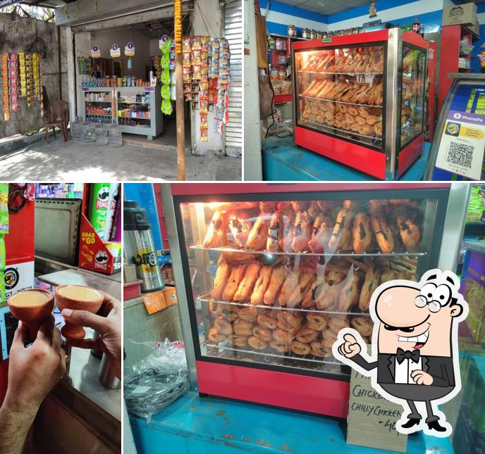 Take a seat at one of the tables at ADDA KHANA