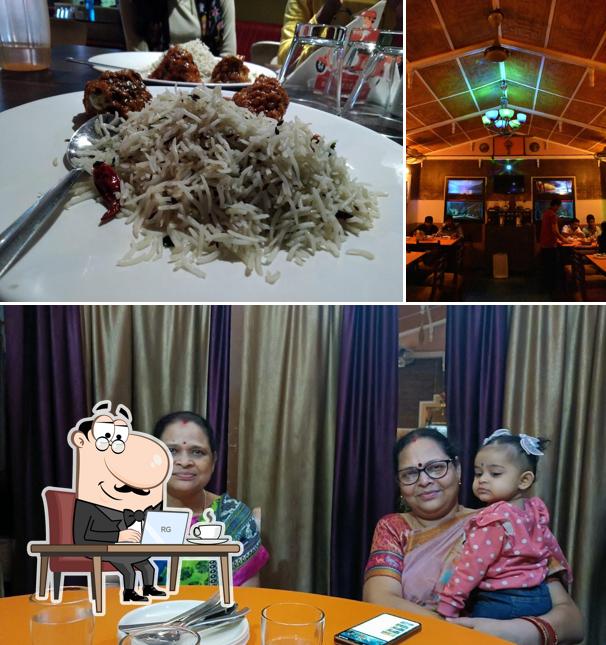 Take a seat at one of the tables at Barabati Restaurant