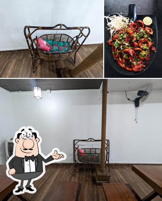 The photo of Bar B Que Inn Family Restaurant Thiruvalla’s interior and food