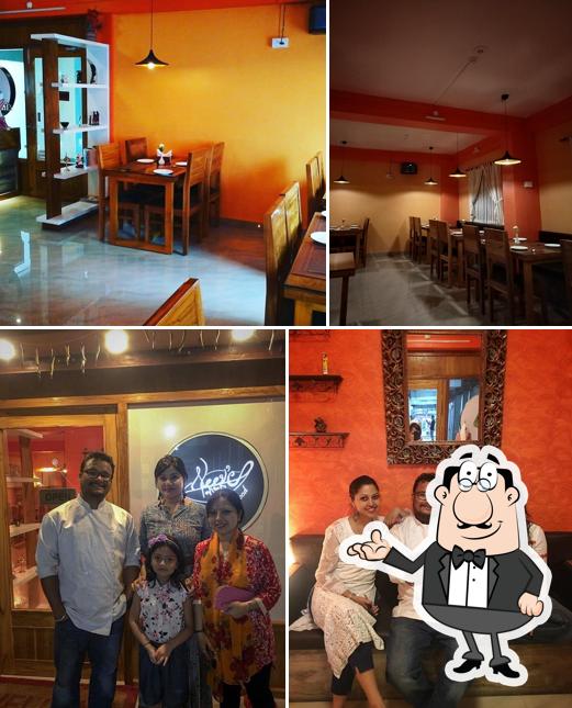 Take a seat at one of the tables at Neev's Restaurant