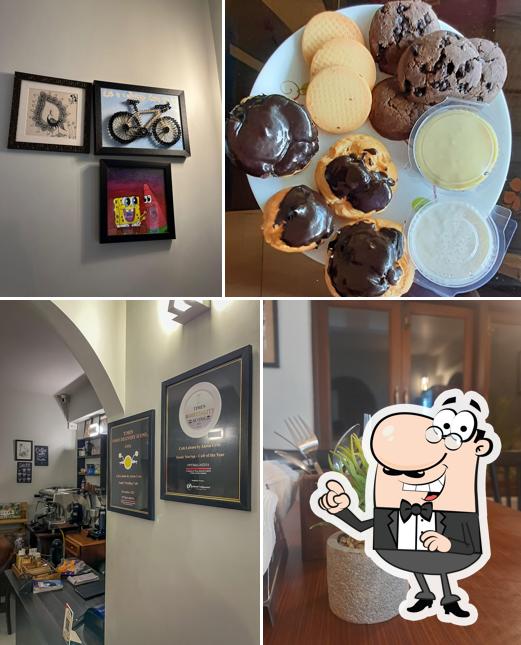 Take a seat at one of the tables at Cafe Labasa Goa