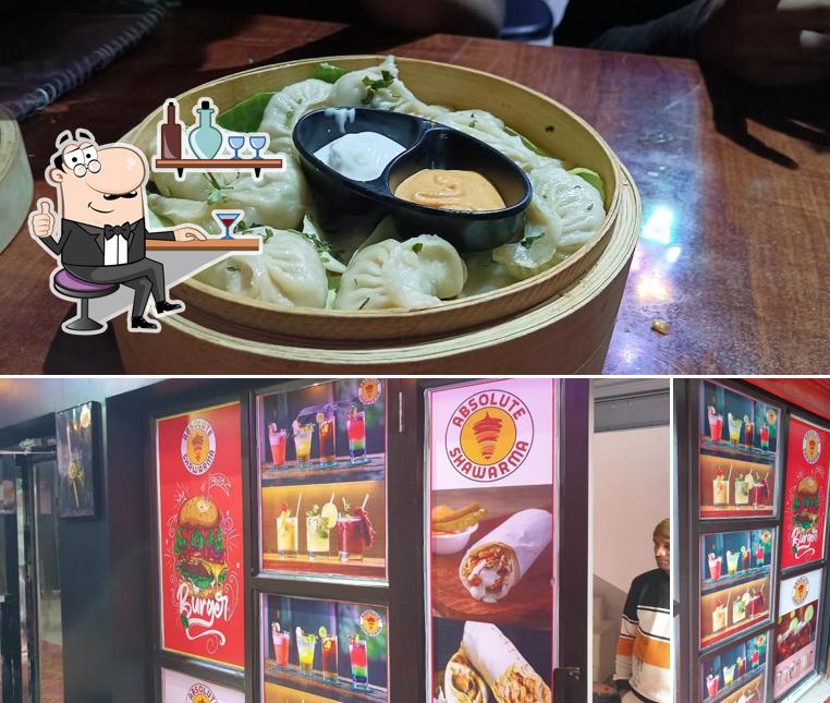 This is the photo depicting interior and food at Absolute Shawarma( Aashiyana Marriage Hall)