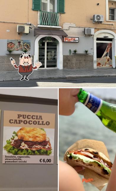 La immagine della cibo e interni di Pizza Store