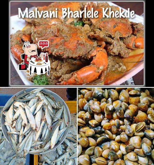 Get various seafood dishes served at Kokan Angan Seafood Restaurants Kolhapur