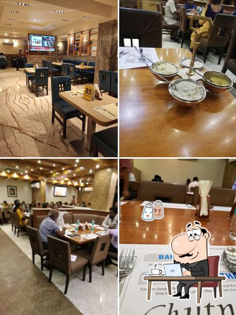 Take a seat at one of the tables at Chutneys