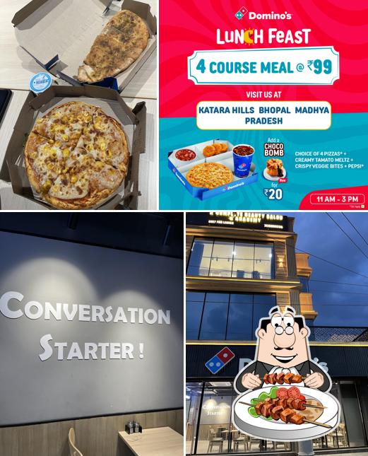 The photo of food and interior at Domino's Pizza Bagmugaliya, Bhopal