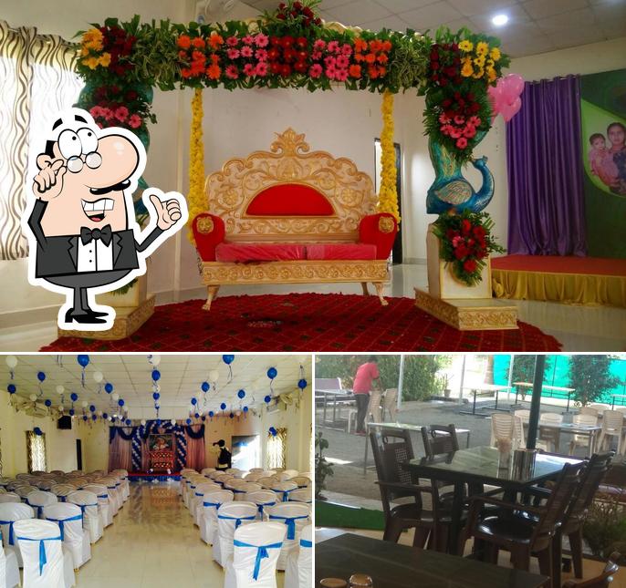 Take a seat at one of the tables at Krushna Garden , Restaurant