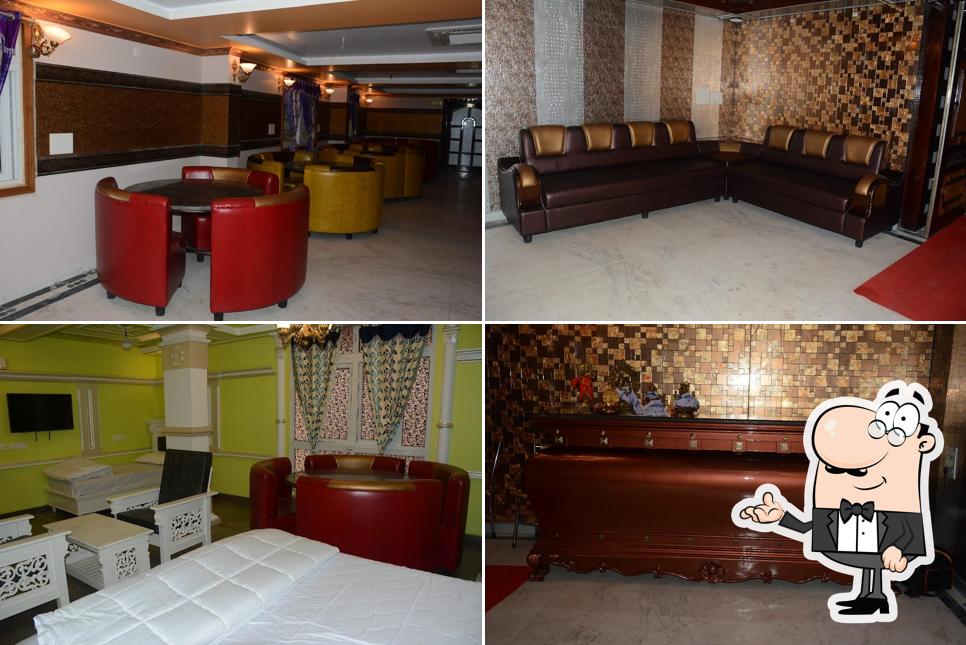 Take a seat at one of the tables at Hotel Sri Radhai Residency