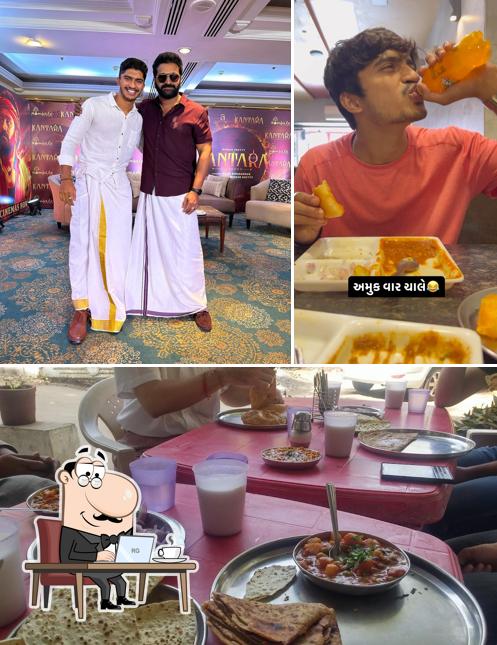 Take a seat at one of the tables at Devarsh