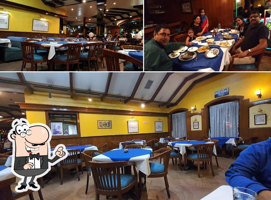 Take a seat at one of the tables at Koshy's