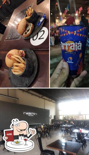 A ilustração do Muretto Music & Beer’s comida e interior