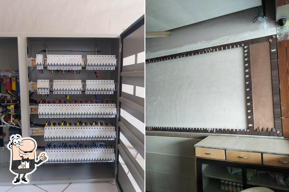 Take a seat at one of the tables at Way Wait Restaurant