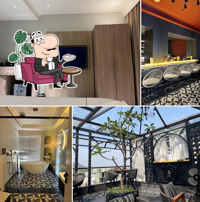 Take a seat at one of the tables at Downtown Prime - A Premium Boutique Hotel Udaipur