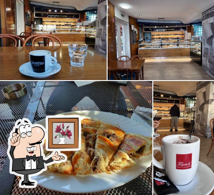 Questa è la immagine che presenta la interni e cibo di Pekarna Arena